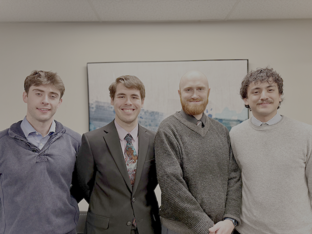 KULO Management team members celebrating success together