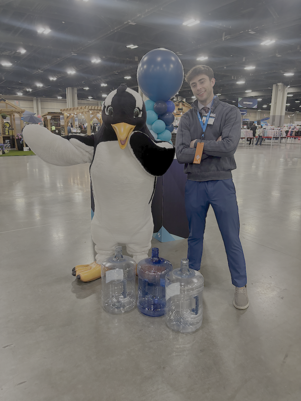 KULO team member at promotional event with brand mascot